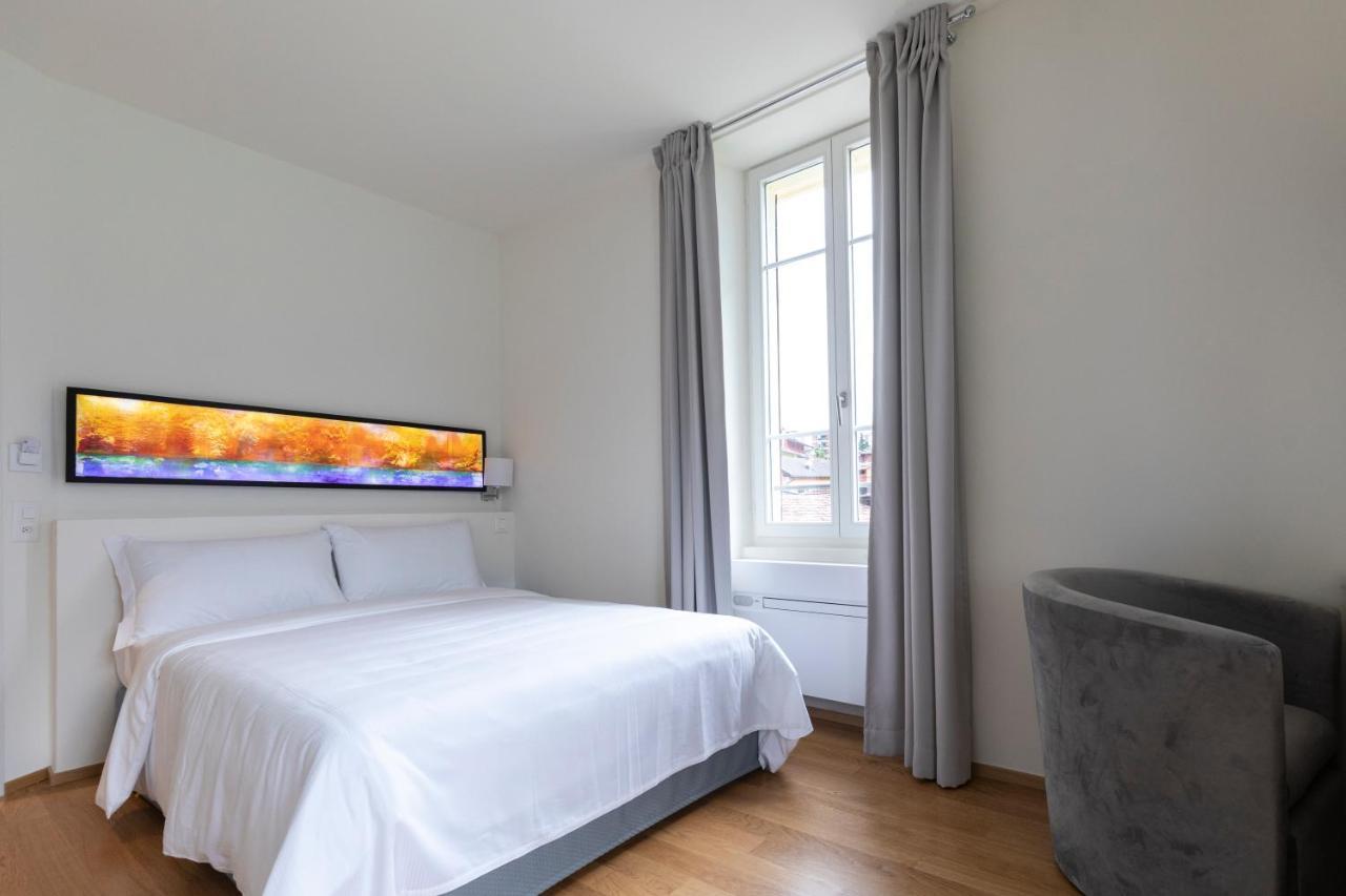 Lac Hotel Melide Bagian luar foto
