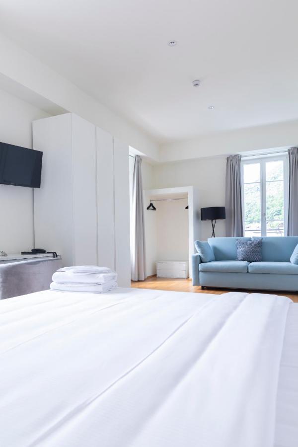 Lac Hotel Melide Bagian luar foto