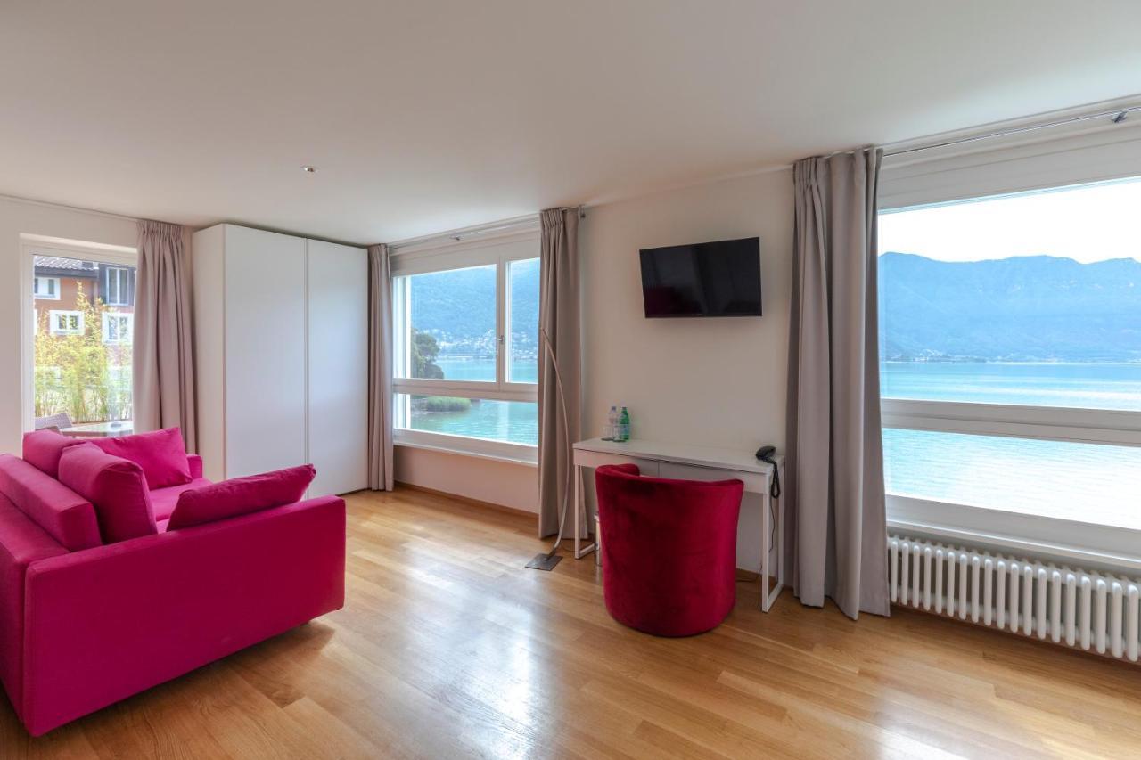 Lac Hotel Melide Bagian luar foto
