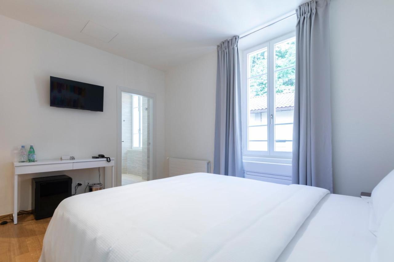 Lac Hotel Melide Bagian luar foto