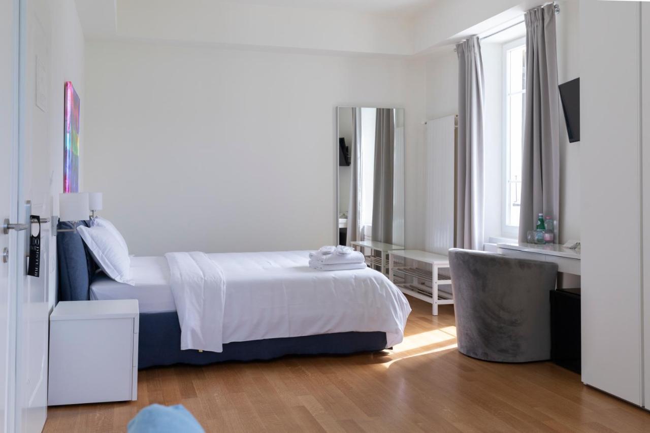 Lac Hotel Melide Bagian luar foto