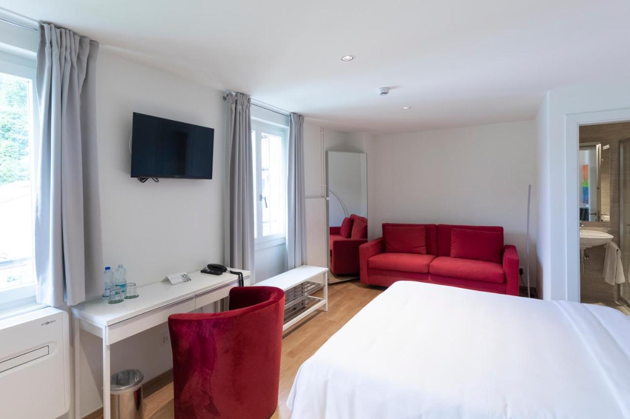 Lac Hotel Melide Bagian luar foto